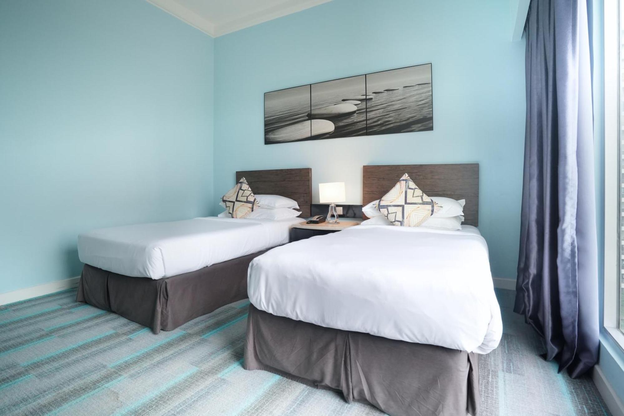 โรงแรมทริสเติล ยะโฮร์ บาห์รู ยะโฮร์บาห์รู ภายนอก รูปภาพ A guest room at the hotel